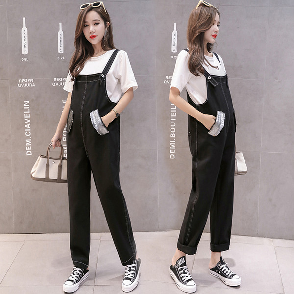 Μοντέρνες φόρμες για έγκυες γυναίκες σε μαύρο χρώμα με πούλιες