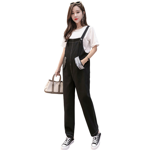 Μοντέρνες φόρμες για έγκυες γυναίκες σε μαύρο χρώμα με πούλιες