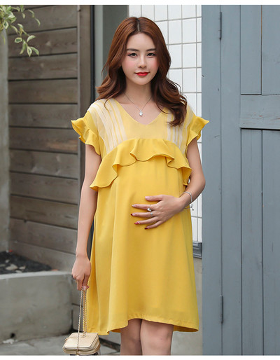 Κομψό φόρεμα για τις έγκυες γυναίκες σε κίτρινο χρώμα
