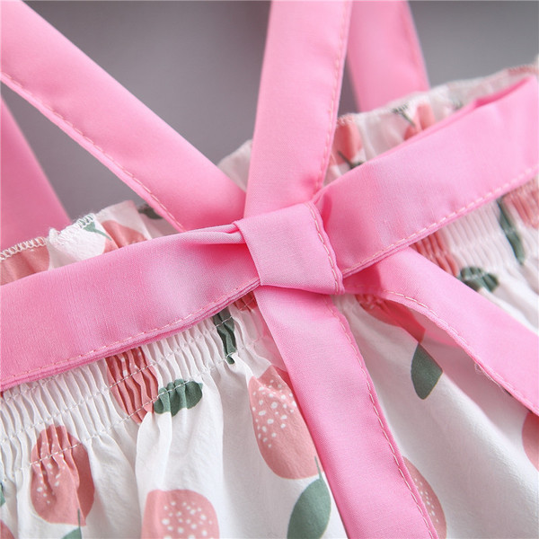 Modern gyerekruha két színben szalaggal és pántokkal