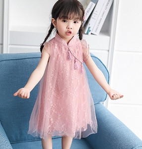 Μοντέρνο παιδικό φόρεμα σε δύο χρώματα με δαντέλα και φούντα