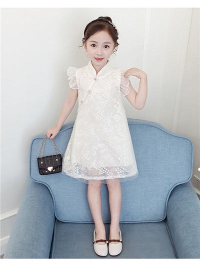 Modern gyerekruha két színben szabott modell csipkével