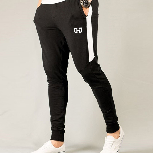 Férfi sportnadrág több színben, zsebekkel