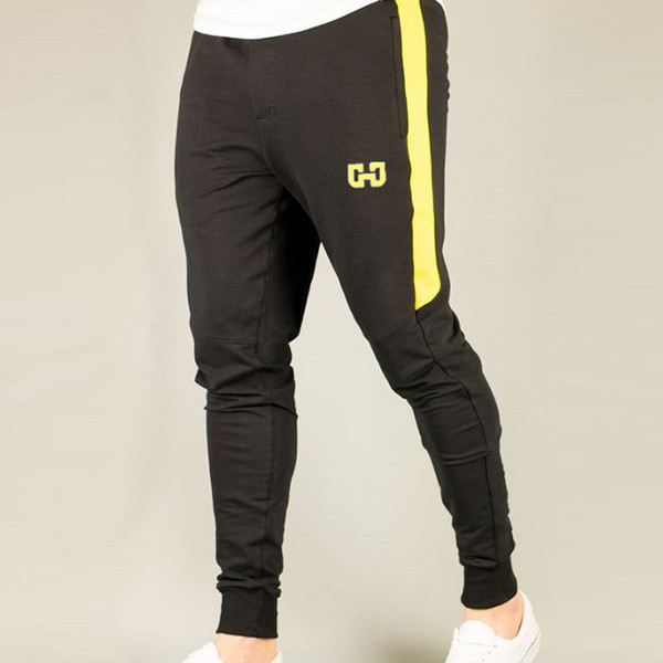 Férfi sportnadrág több színben, zsebekkel