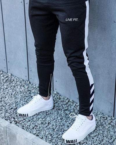 Férfi sportnadrág két színben, cipzárral