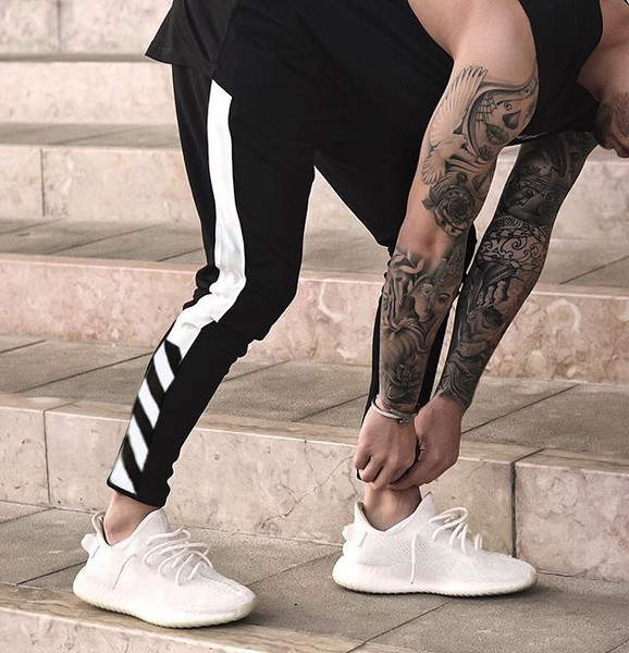 Férfi sportnadrág két színben, cipzárral