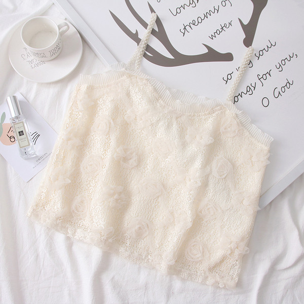 Női felső csipkével és pántokkal