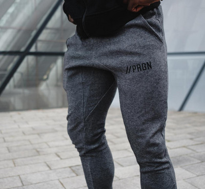 Μοντέρνα ανδρικά αθλητικά παντελόνια σε δύο χρώματα με επιγραφή