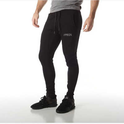 Μοντέρνα ανδρικά αθλητικά παντελόνια σε δύο χρώματα με επιγραφή