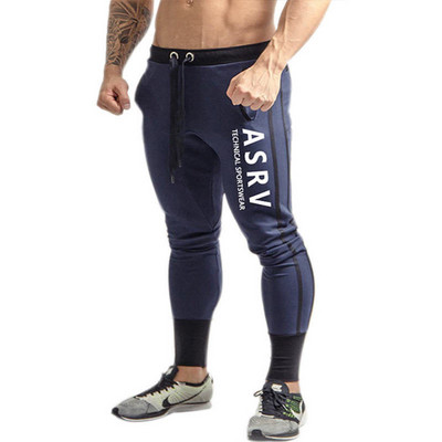 Férfi sportnadrág több színben felirattal