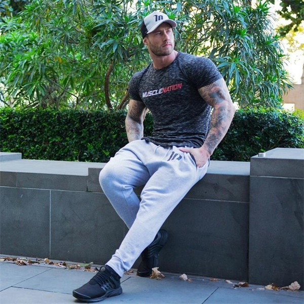 Τρία χρώματα αθλητικά ανδρικά παντελόνια με τσέπες