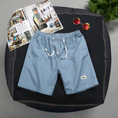 Férfi alkalmi nadrág négy színben nyakkendővel