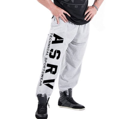 Divatos férfi sportnadrág négy színben felirattal