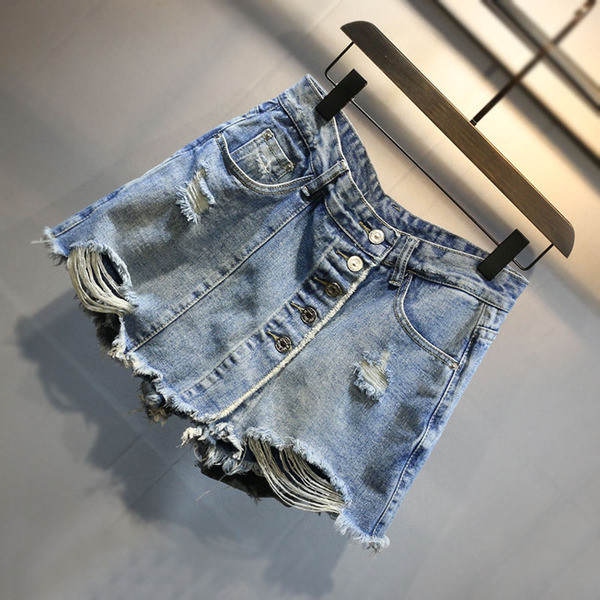 Stílusos női szoknya-nadrág szakadt motívumokkal