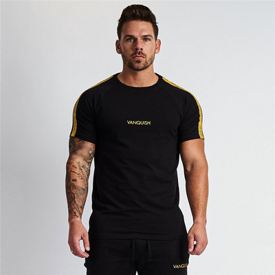 Αθλητικό μπλουζάκι σε μαύρο και κίτρινο χρώμα με επιγραφή