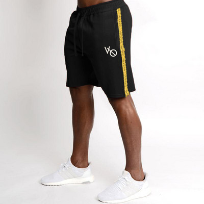 Спортен мъжки къс панталон в черен и жълт цвят