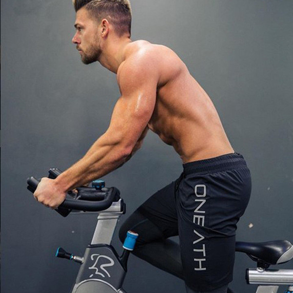 Férfi sportnadrág fekete színben felirattal