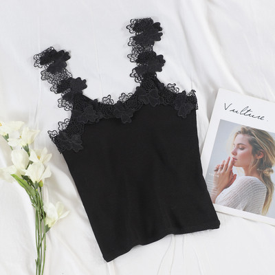 Stílusos női felső, fehér és fekete színben, csipkével