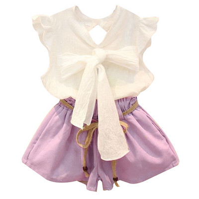 Modern, kétrészes nadrágból és blúzból álló gyerekszett lányoknak