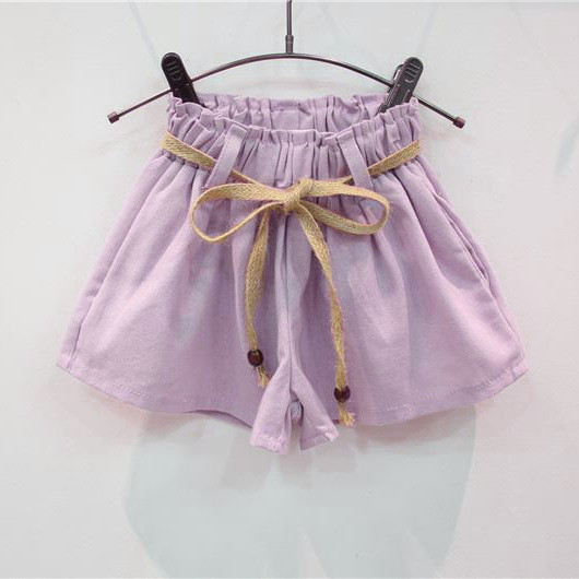 Modern, kétrészes nadrágból és blúzból álló gyerekszett lányoknak