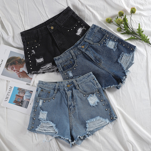 Női farmer rövidnadrág szakadt motívumokkal