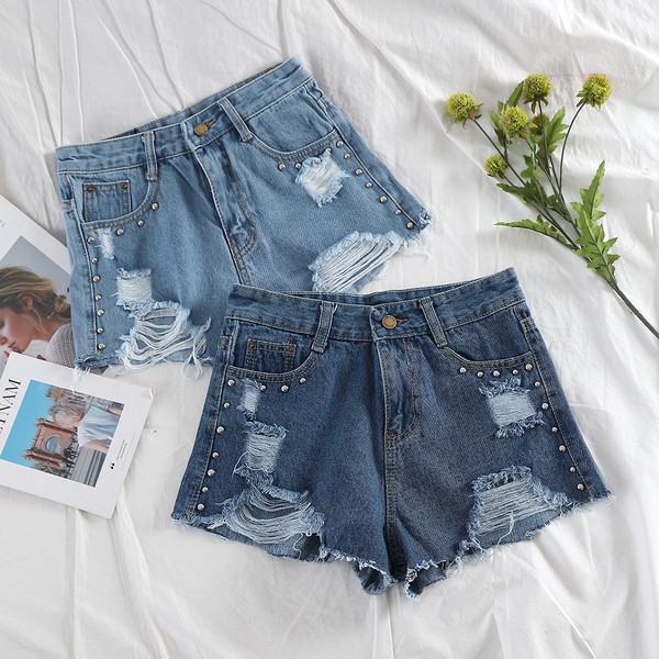 Női farmer rövidnadrág szakadt motívumokkal