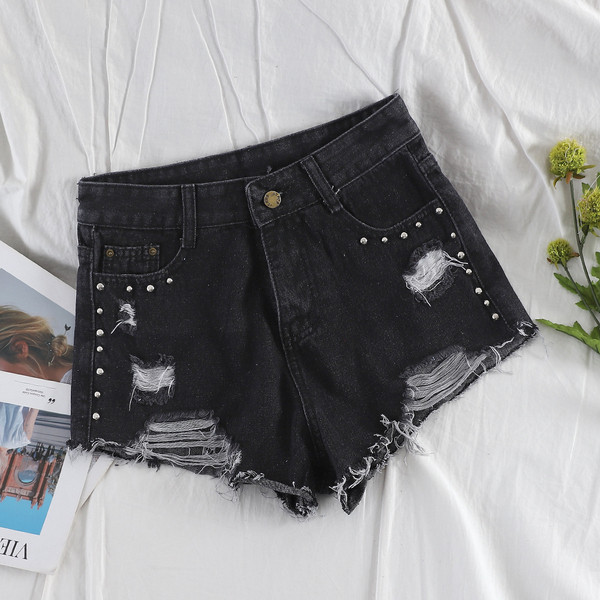 Női farmer rövidnadrág szakadt motívumokkal