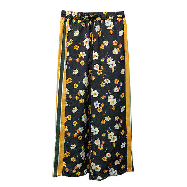 Modern női nadrág nyakkendővel és szegéllyel