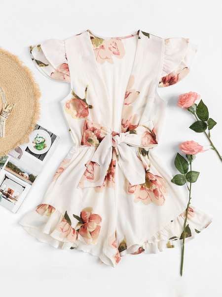 Modern női overál mély nyakkivágással és két színű szalaggal