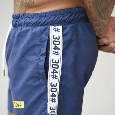 Alkalmi férfi rövidnadrág négy színben felirattal