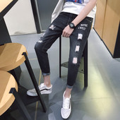 Modern férfi farmer, szakadt motívumokkal, fekete színben