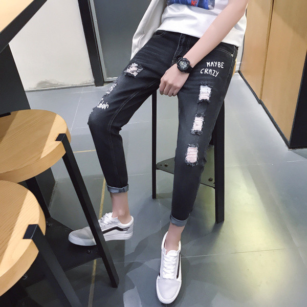 Modern férfi farmer, szakadt motívumokkal, fekete színben