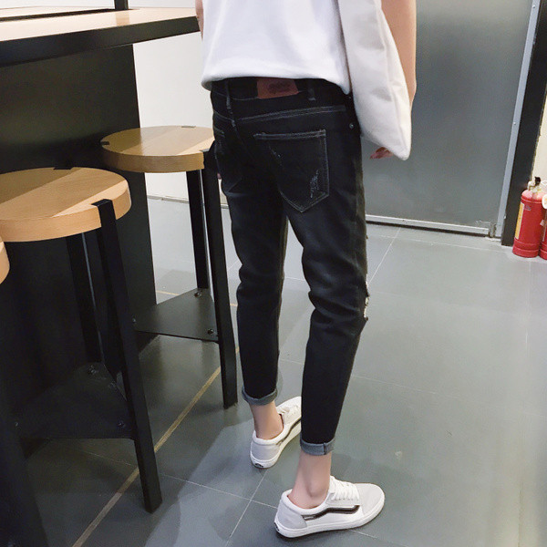 Modern férfi farmer, szakadt motívumokkal, fekete színben