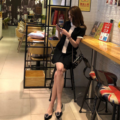 Elegáns női ruha rövid ujjú fekete színben