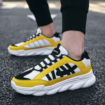 Κομψά ανδρικά αθλητικά παπούτσια σε λευκό, μαύρο και κίτρινο χρώμα