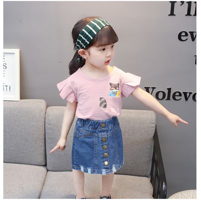 Modern, kétrészes szoknyából és blúzból álló gyerekszett lányoknak