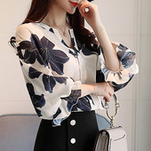 Stílusos női ing fehér színben, virágos motívumokkal