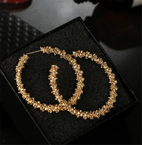 Stílusos női fülbevaló kerek formában - ezüst és arany színben