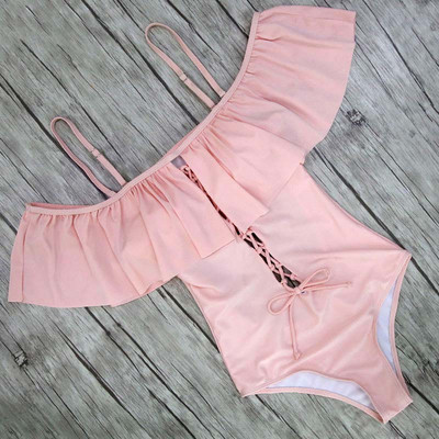 Modern női fürdőruha több színben, nyakkendővel