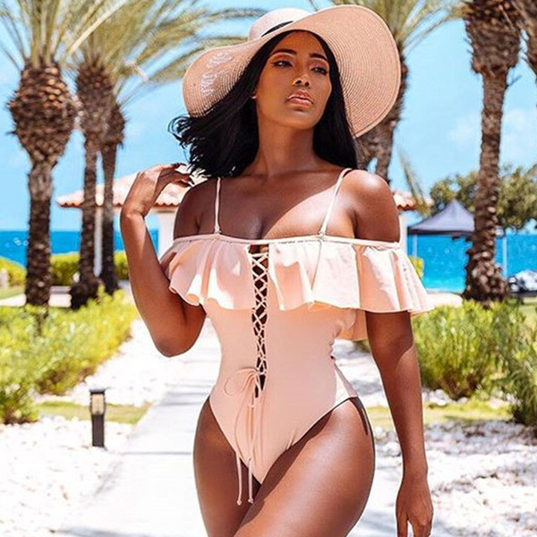 Modern női fürdőruha több színben, nyakkendővel