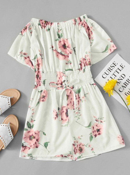 Modern női overál nyakkendővel és virágmotívumokkal, négy színben