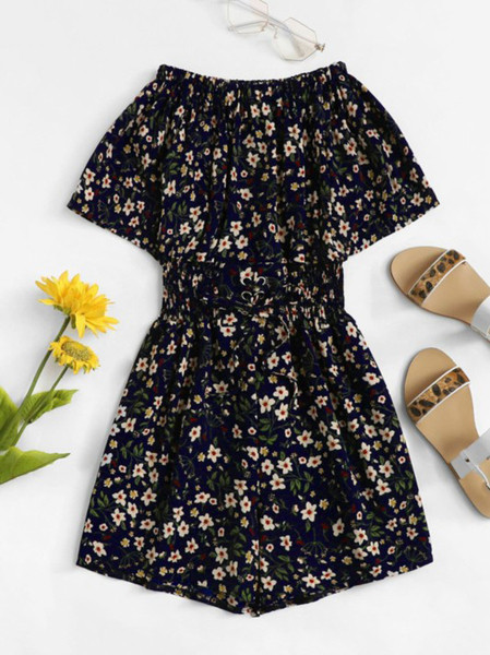 Modern női overál nyakkendővel és virágmotívumokkal, négy színben