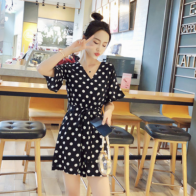 Κομψή γυναικεία ολόσωμη φόρμα με ντεκολτέ σε σχήμα V σε κόκκινο και μαύρο χρώμα