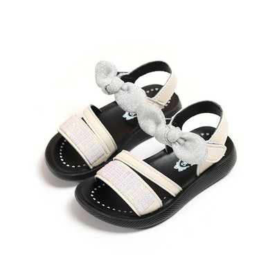 Modern gyerekszandál lányoknak kövekkel és szalaggal