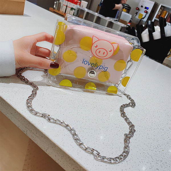 Modern női táska átlátszó huzattal és hosszú fém kabáttal, három színben