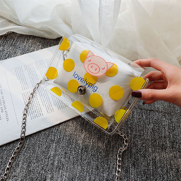 Modern női táska átlátszó huzattal és hosszú fém kabáttal, három színben