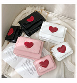 Modern női táska eko bőrből, hosszú fémlánccal két méretben