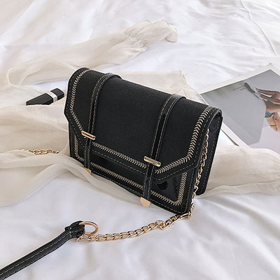 Modern női táska öko bőrből, 3D fém elemekkel és hosszú fémlánccal