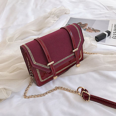 Modern női táska öko bőrből, 3D fém elemekkel és hosszú fémlánccal