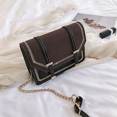 Modern női táska öko bőrből, 3D fém elemekkel és hosszú fémlánccal